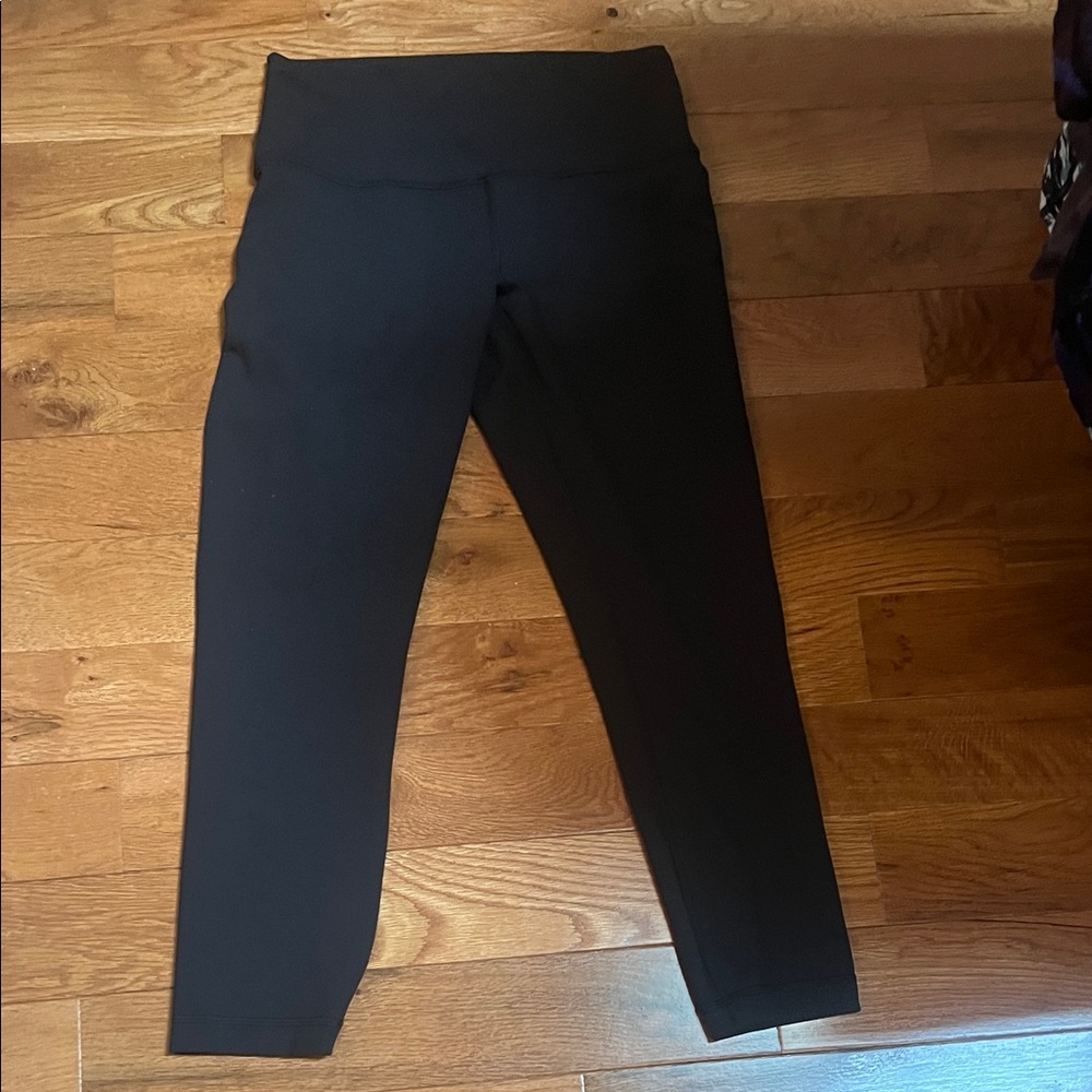 Black High-Waisted lululemon Leggings, size 8.